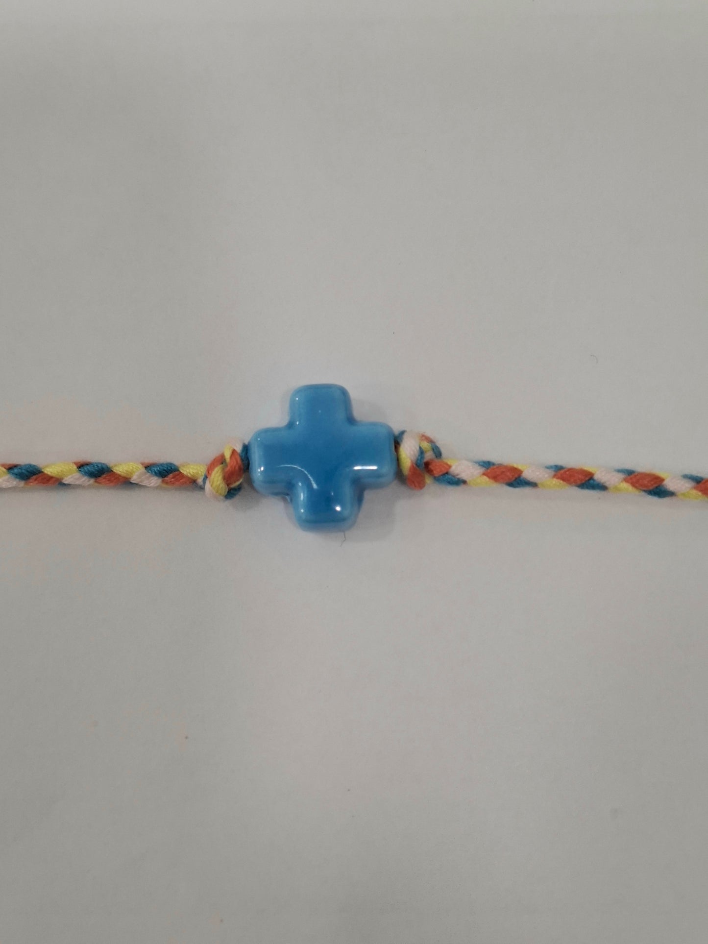 Pulsera CRUZ cerámica hilo