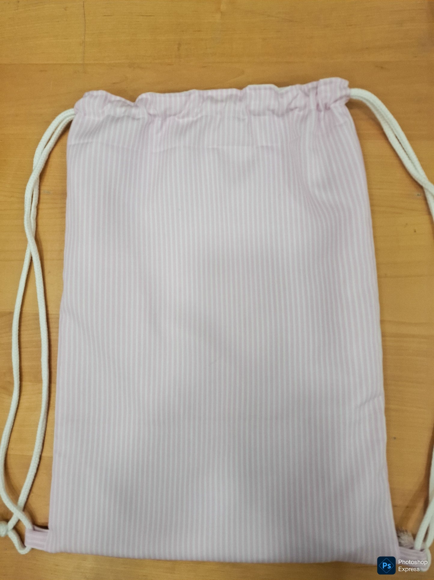 Mochila y toalla RAYITAS rosa claro