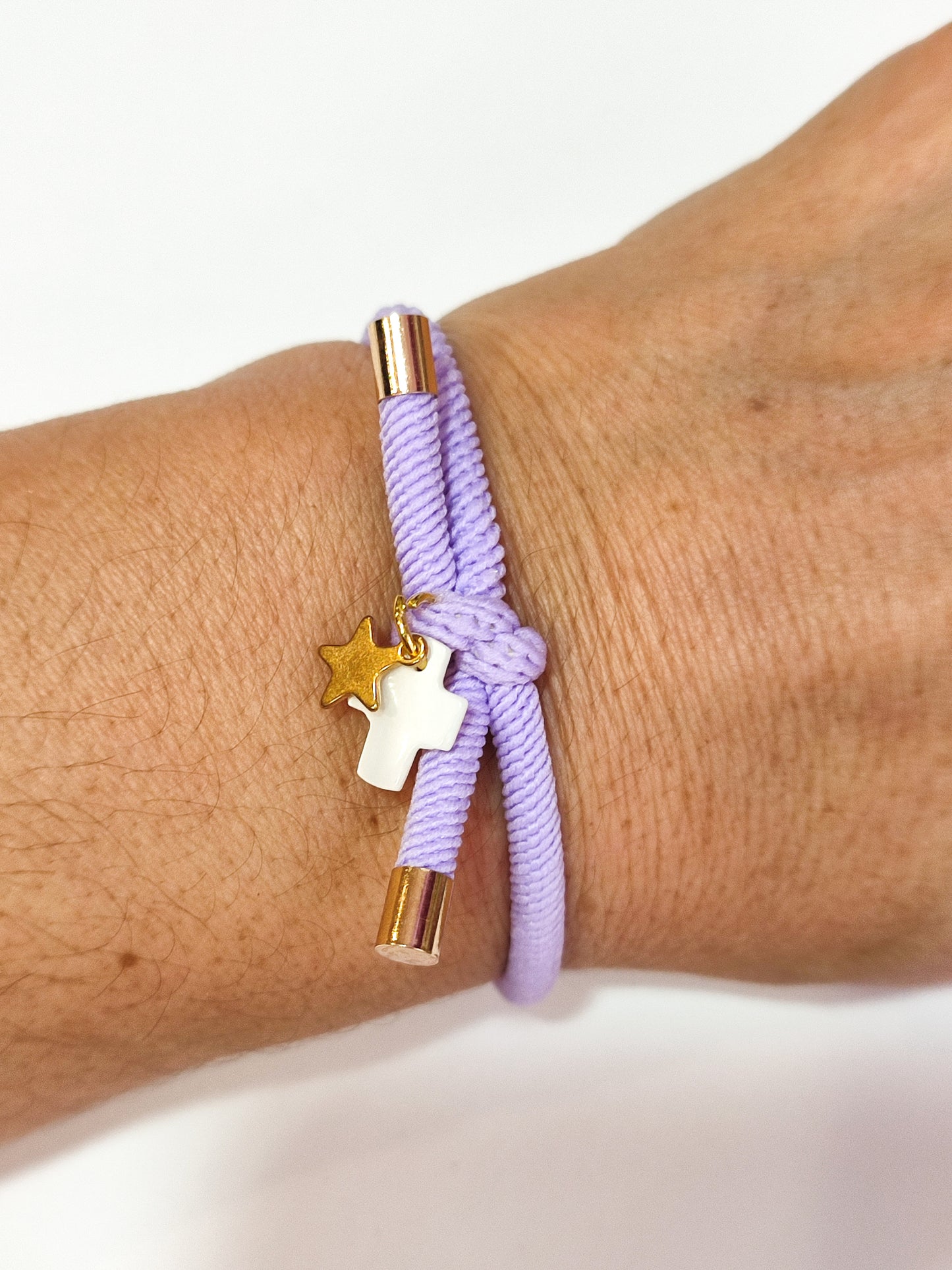 Pulsera nudo CRUZ NÁCAR Y ESTRELLA DORADA